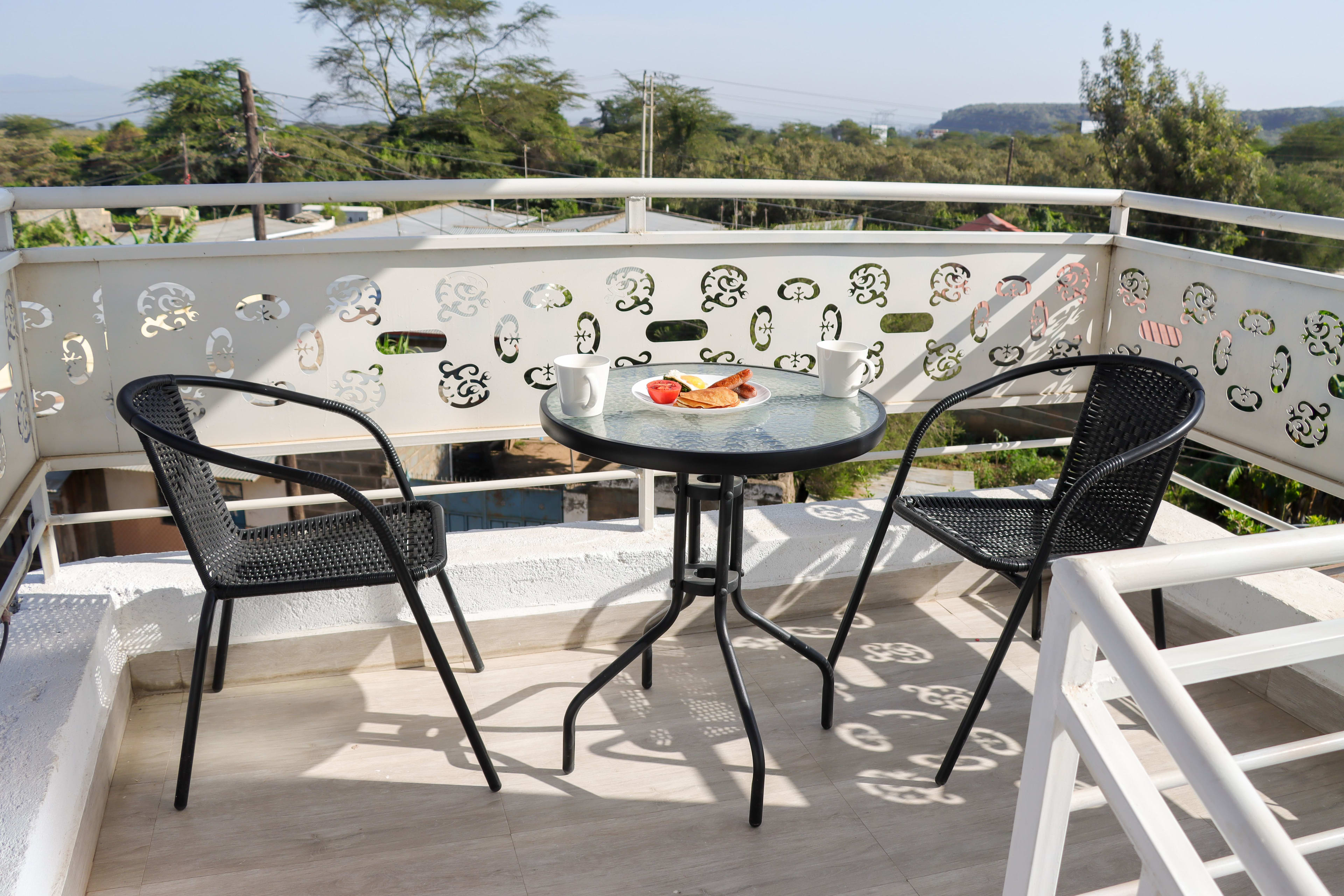 Outdoor Fireplace and Serene Garden at Jazby Guest House in Naivasha - Image 3