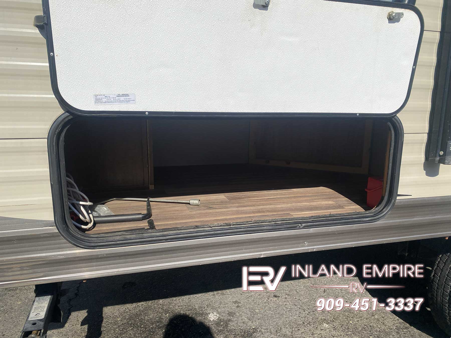 Storage compartment on the passenger side