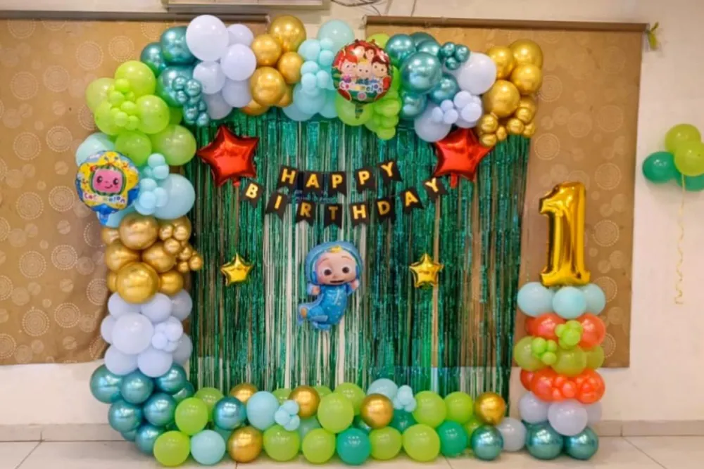 Cocomelon theme for kids birthday decoration with arch setup 