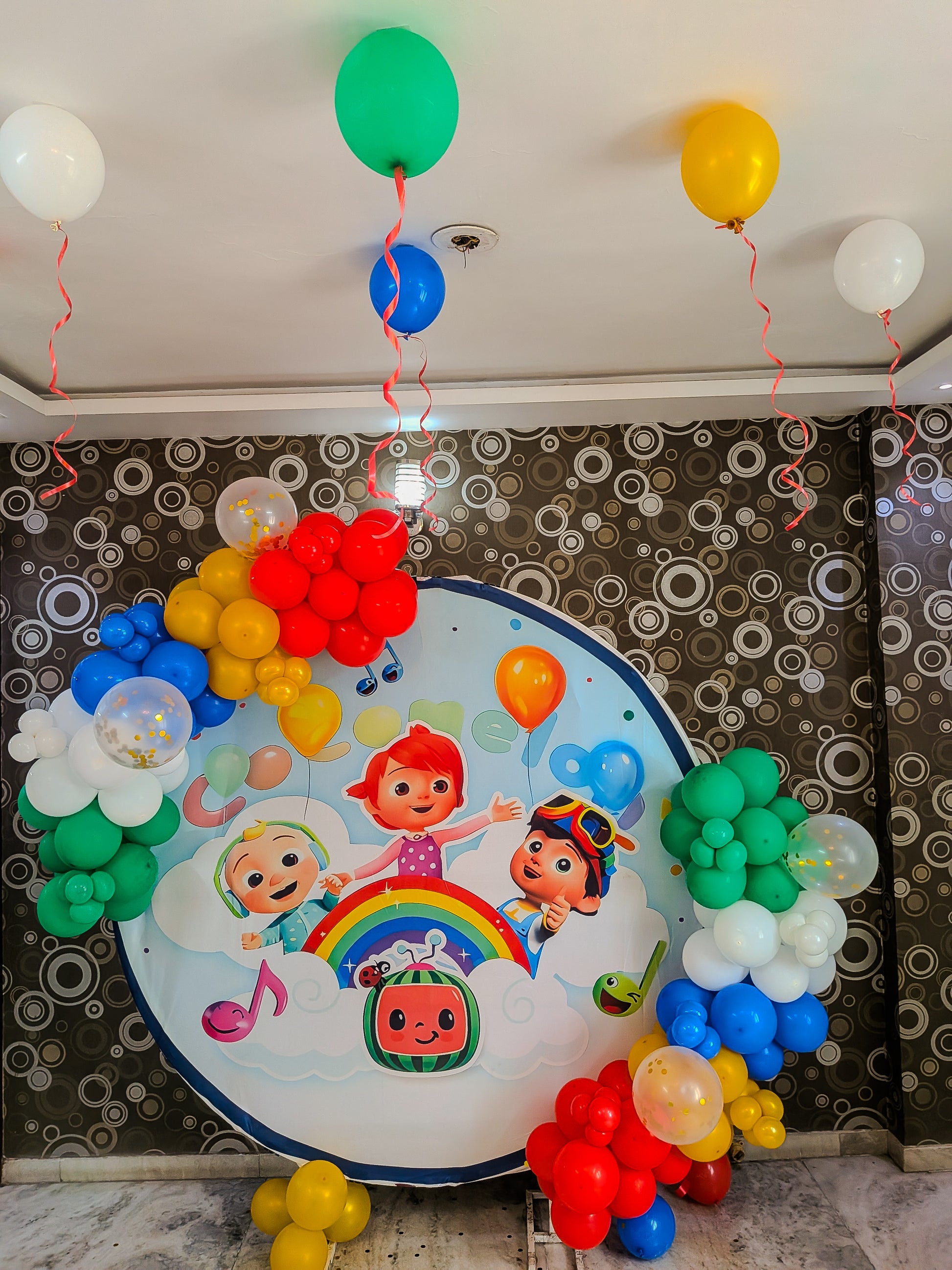 Cocomelon theme for kids birthday decoration in Ring setup 
