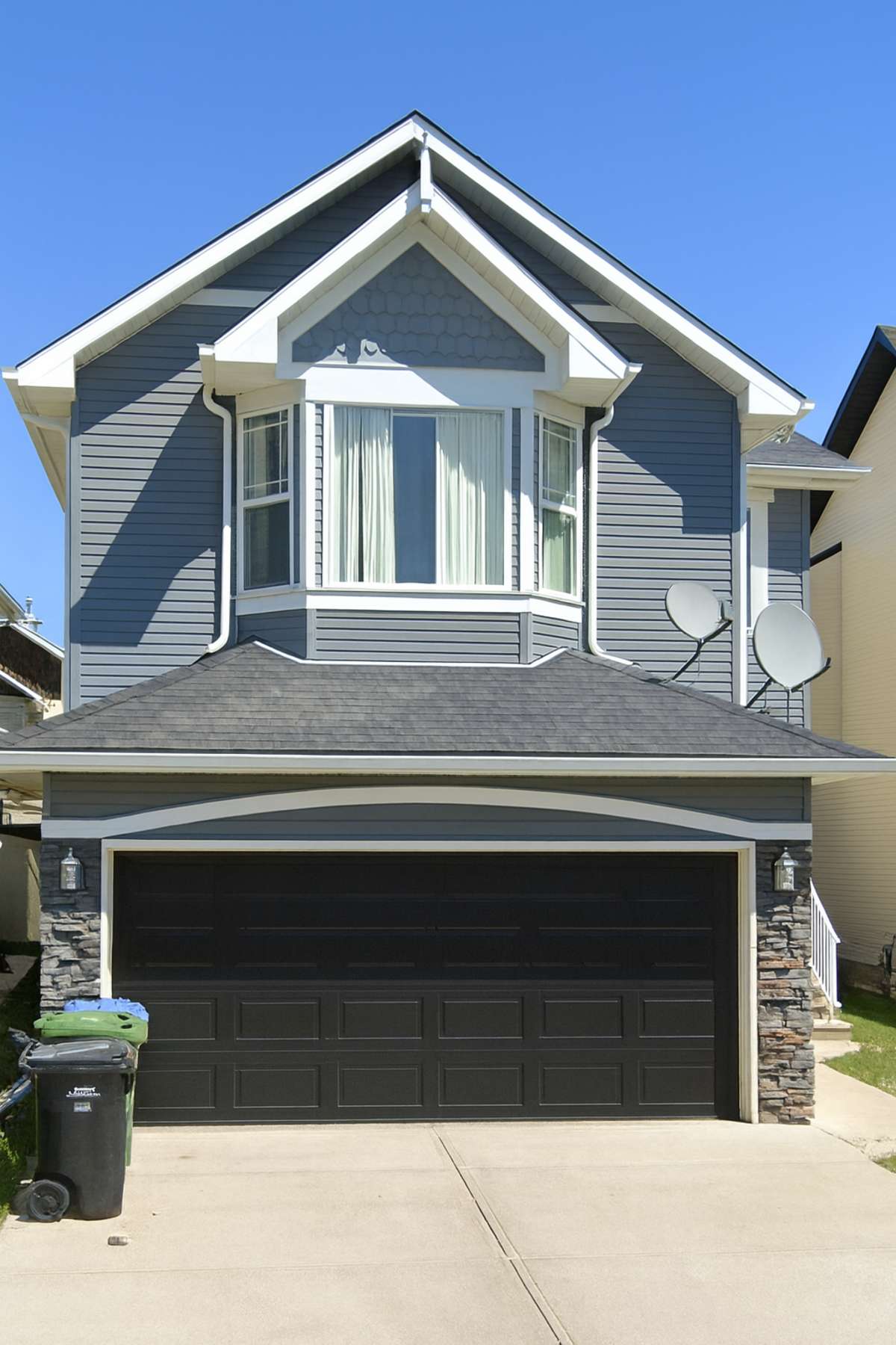 Exterior house painting Calgary after