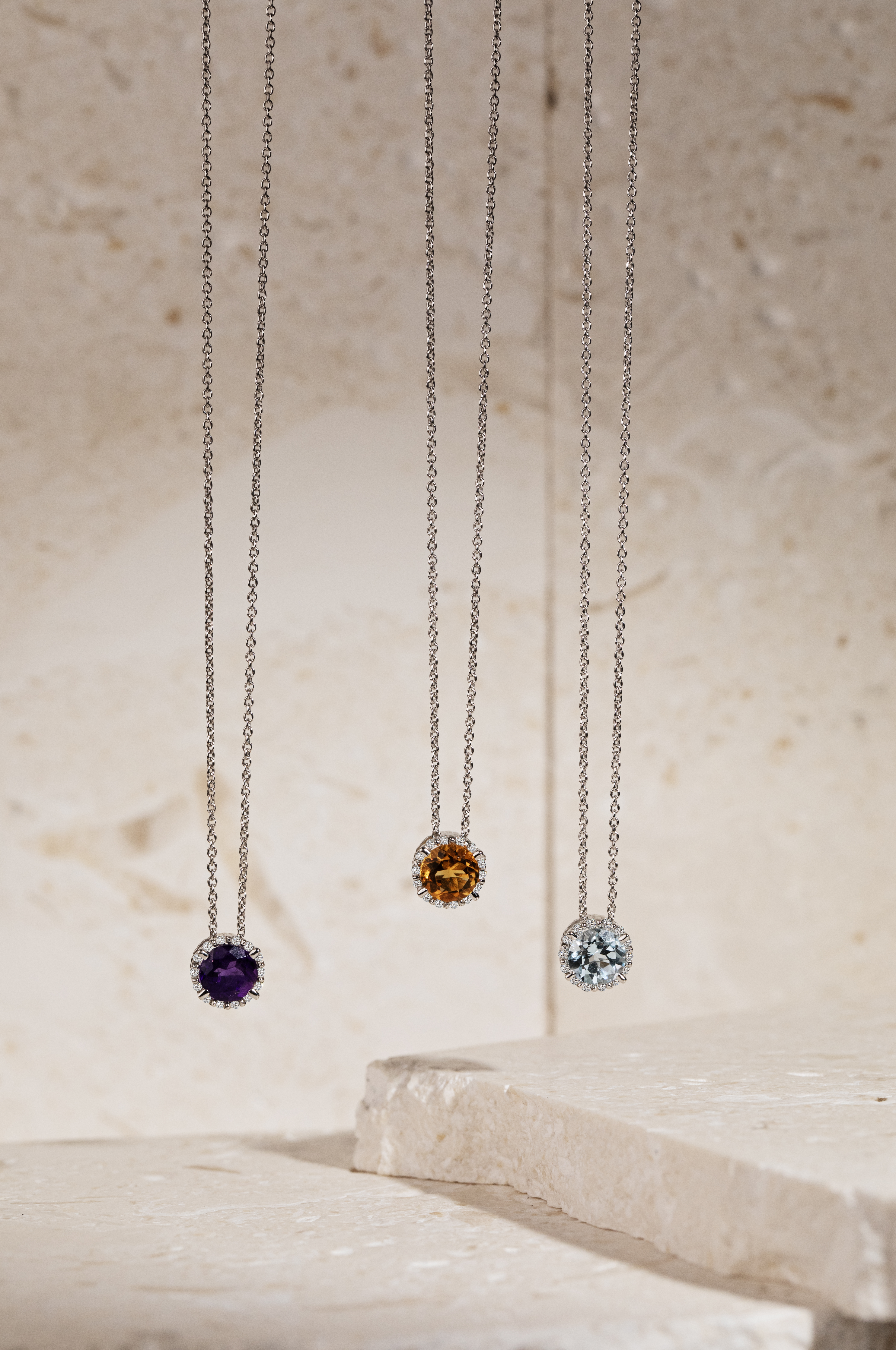 Gemstone and diamond necklaces in 14k white gold â€” amethyst, citrine, and blue topaz