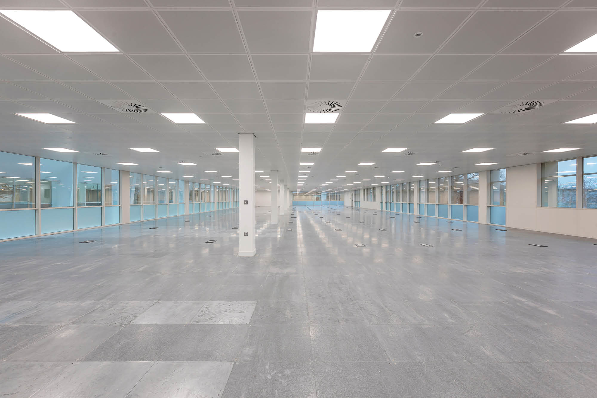 Empty office space showing various open space for office fit out.