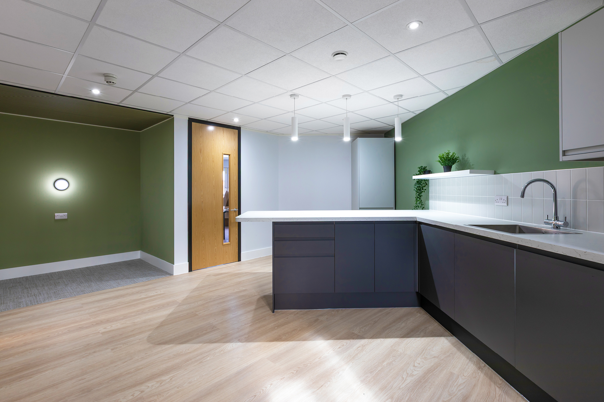 modern office fit out entrance featuring logo signage