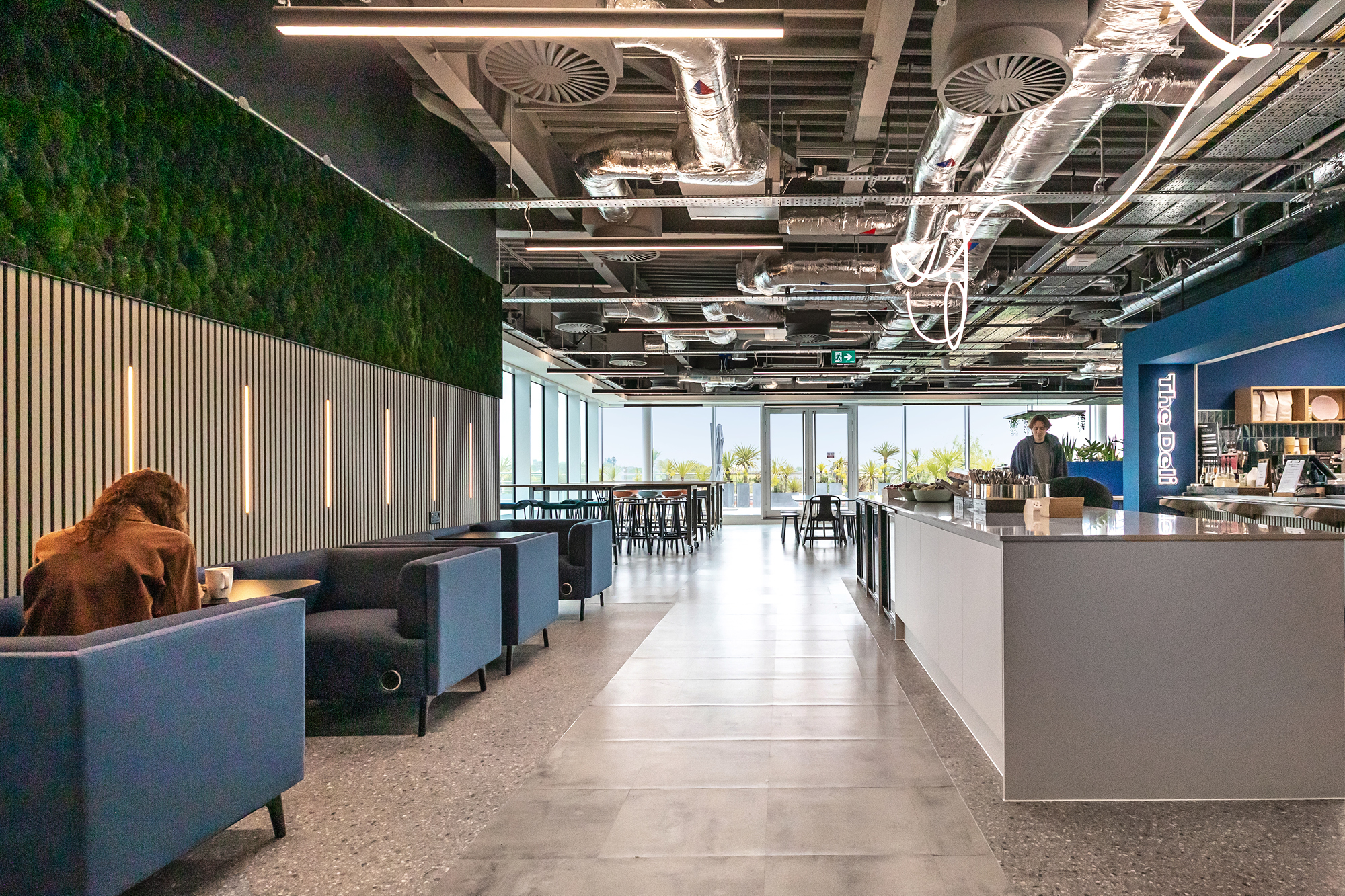 modern office fit out entrance featuring business logo signage