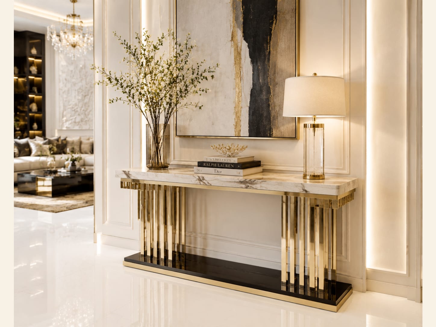 Keep the form slim with tiered gold legs Slim marble console table with tiered vertical gold legs, abstract art and a glass lamp