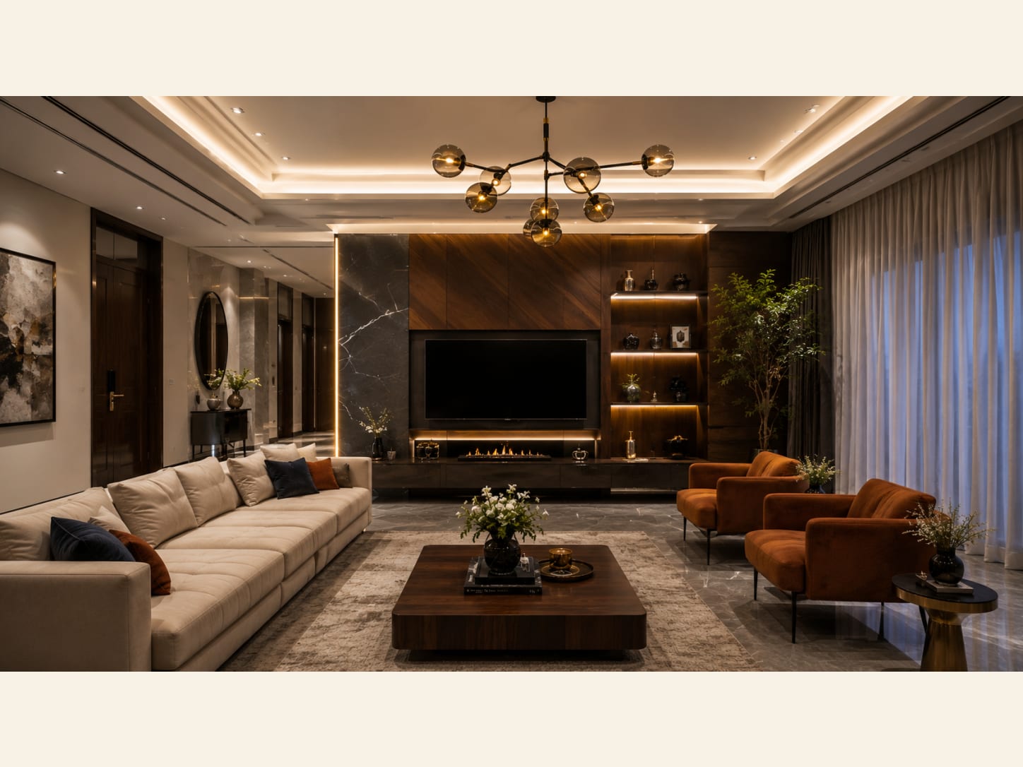 A warm walnut panel holds the screen above a long ribbon fireplace, edged by dark marble with a single LED line, with lit display niches, a cream sectional and rust armchairs.