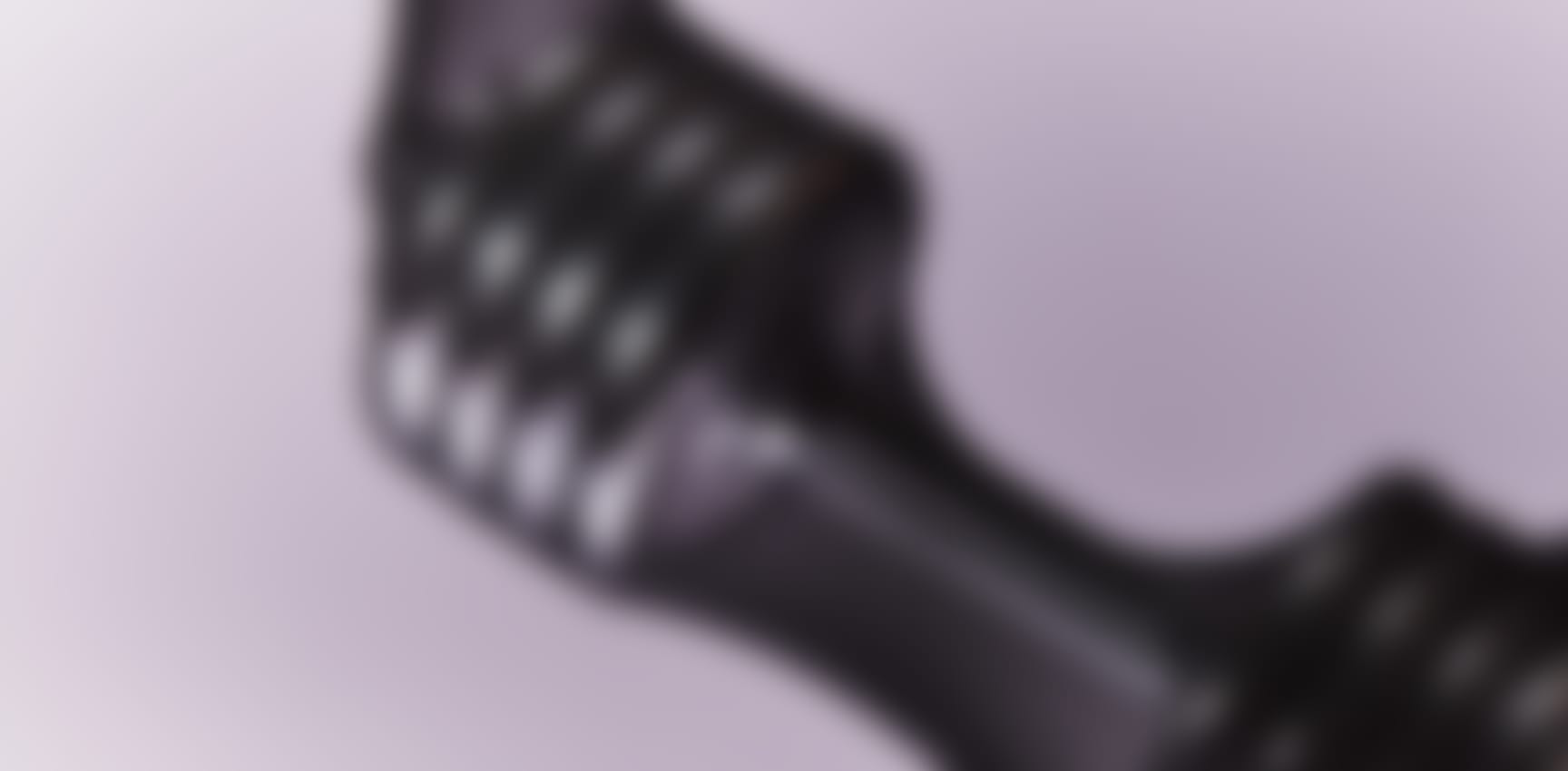 Close-up demonstration of Sheertex's rip-resistant knit technology on desktop