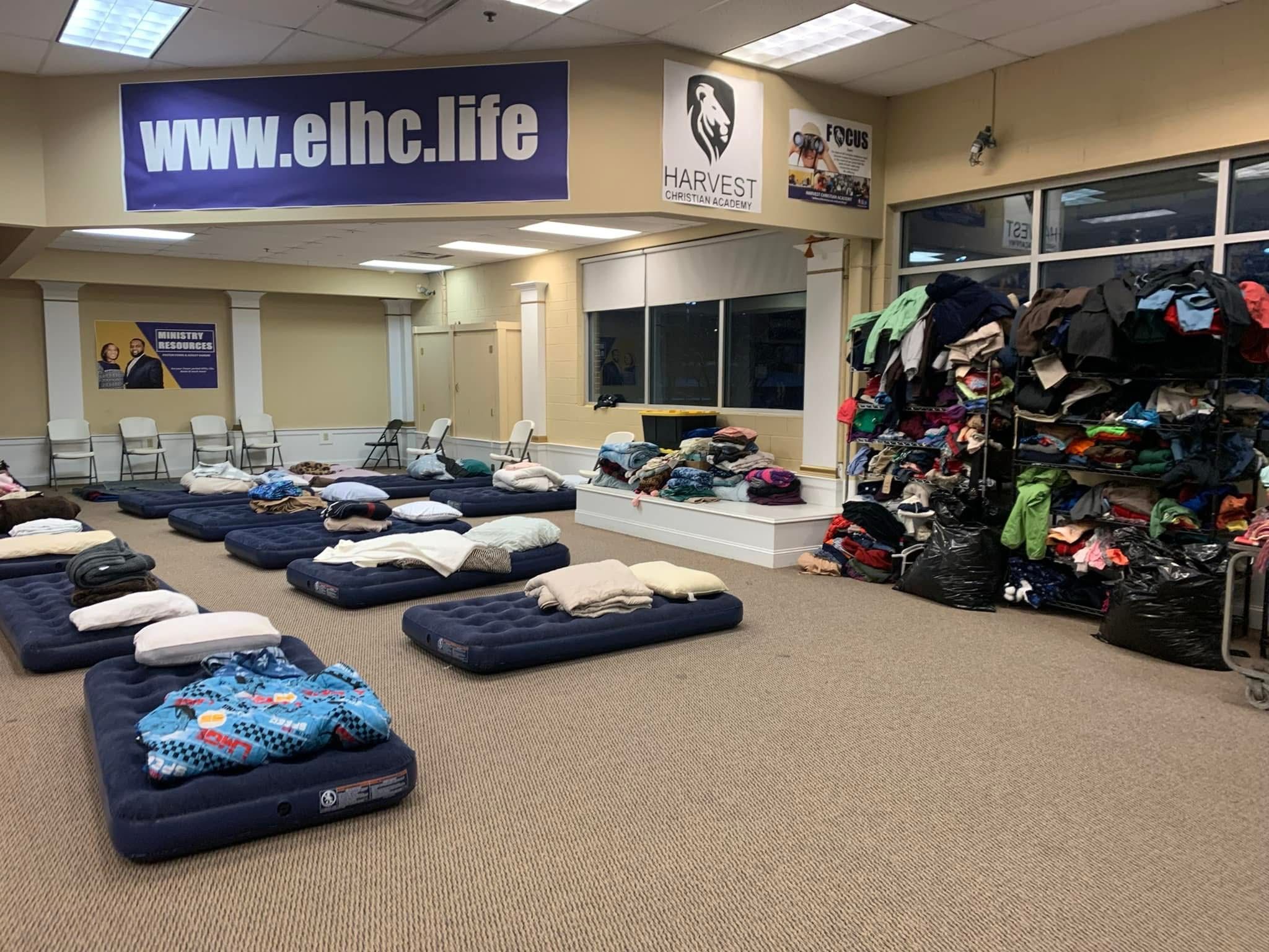 Community outreach event with volunteers serving food