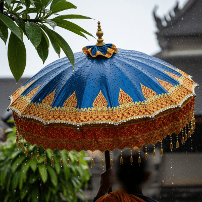 A realistic image of a Ceremonial Umbrella (umbrellas) being used outdoors during a light rain, with droplets visible on the umbrella surface