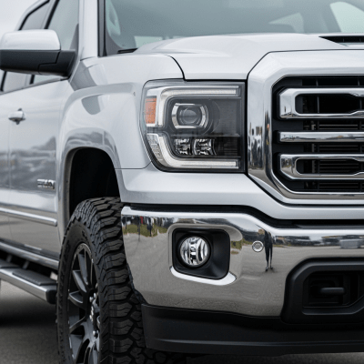 Close-up photograph focusing on distinctive details of a Crew Cab Pickup Truck from the trucks taxonomy