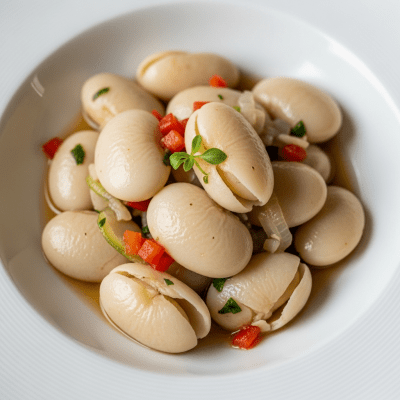 Image of cooked or prepared Jack Bean (legumes) as it appears in a traditional dish or common culinary usage, presented on a clean plate with minimal garnish