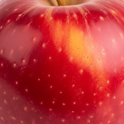 A detailed macro shot focusing on the skin texture and color variation of a Jonathan