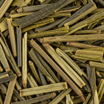 Macro photograph focusing on the texture and details of Kukicha leaves, within the taxonomy teas