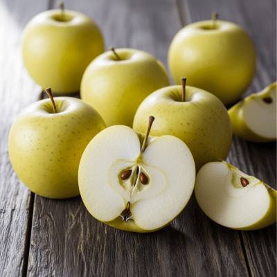 A simple arrangement showing several whole and one cut-open Lodi, displayed on a wooden surface