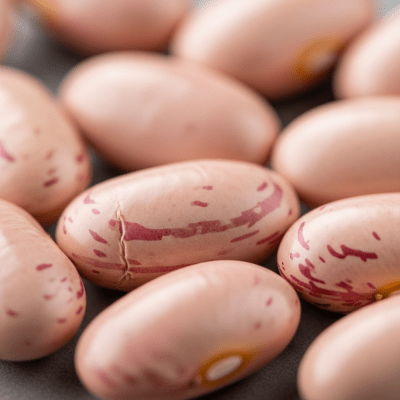 A close-up macro shot of Pink Bean (beans) showing its texture, surface details, and natural colors