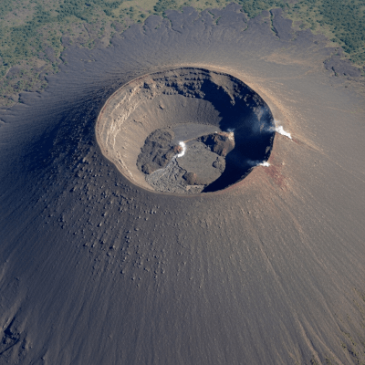 Aerial view photograph of the Shield volcano, showcasing its shape and crater from above