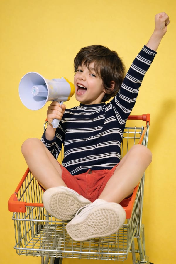 Boy shouting in megaphone