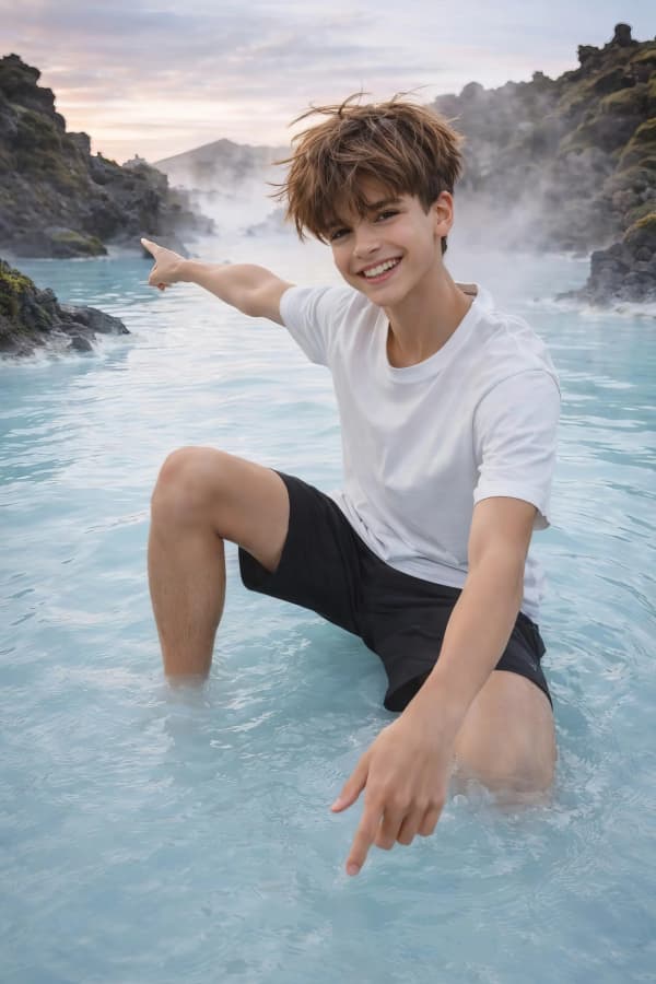 Boy sitting on beach