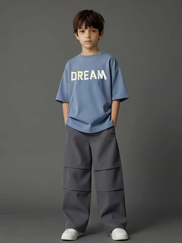Boy standing in studio