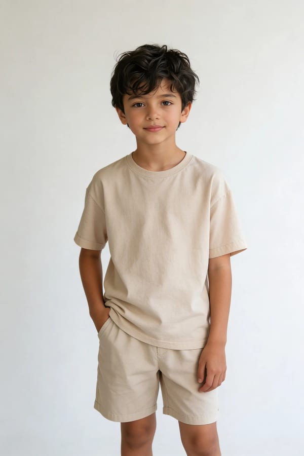 Boy in plain clothes studio