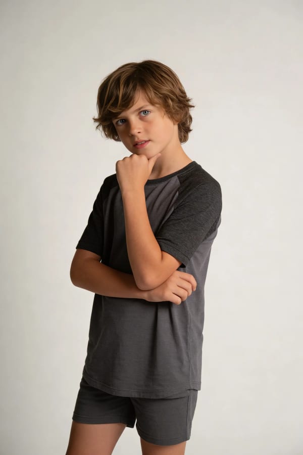Boy touching head