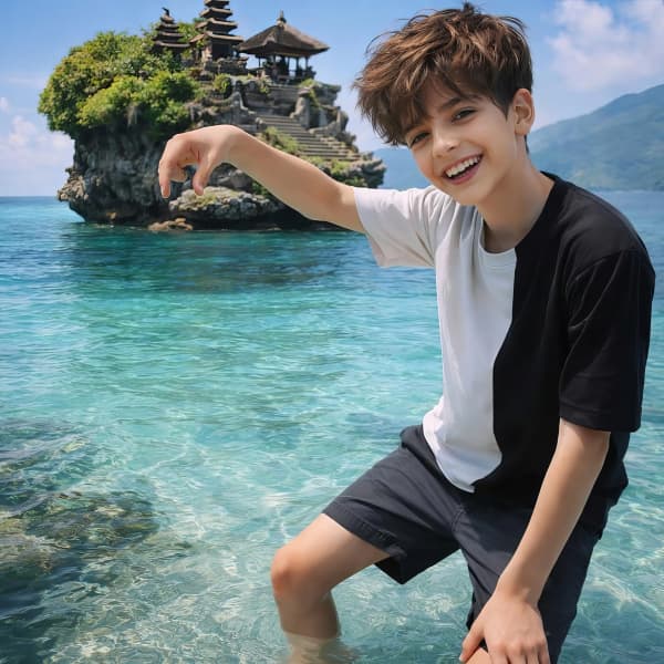 Boy playing in shallow water