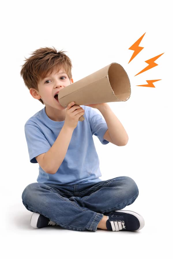 Boy shouting through cardboard tube