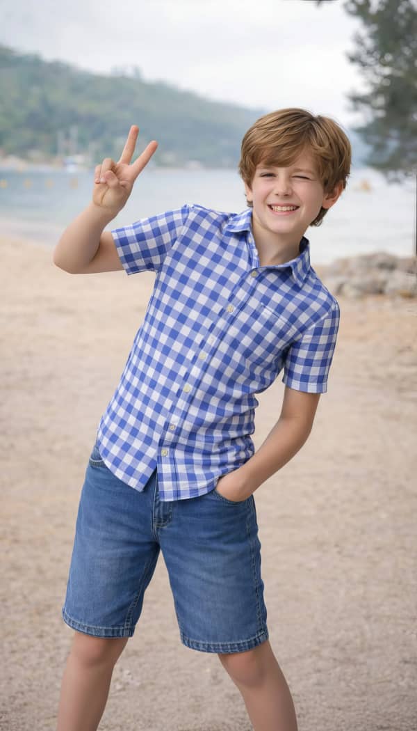 Boy Wearing Sunglasses Pose At Beach