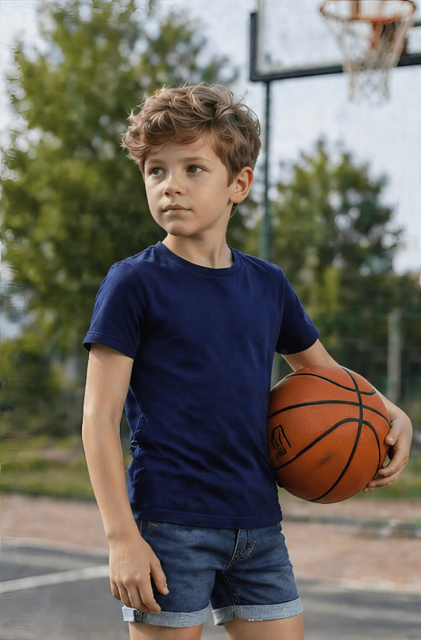 Boy with basketball outdoors