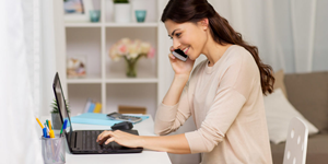 Image of lady're sitting front of the laptop