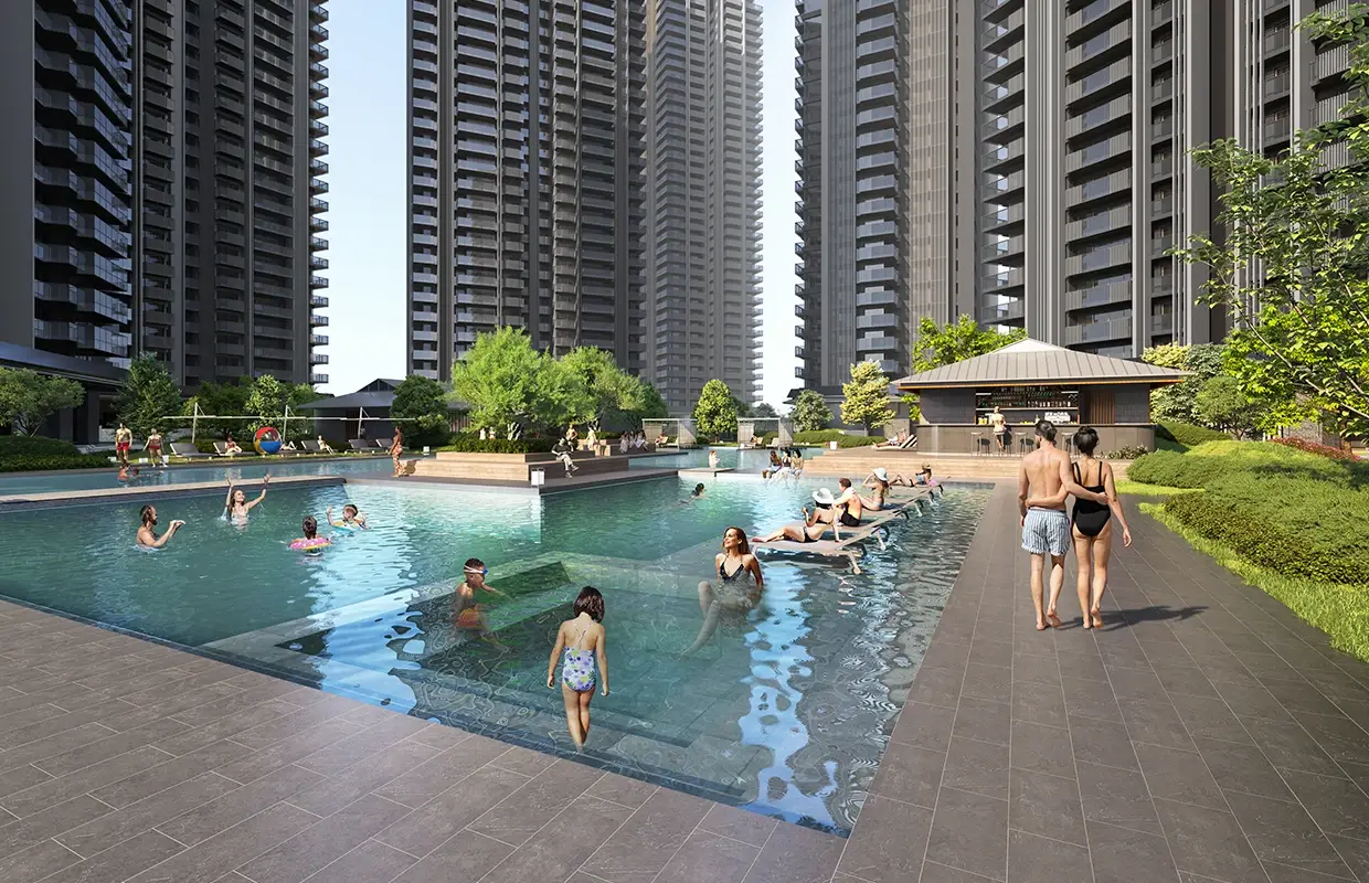 A large swimming pool with people relaxing, surrounded by tall residential buildings and greenery.