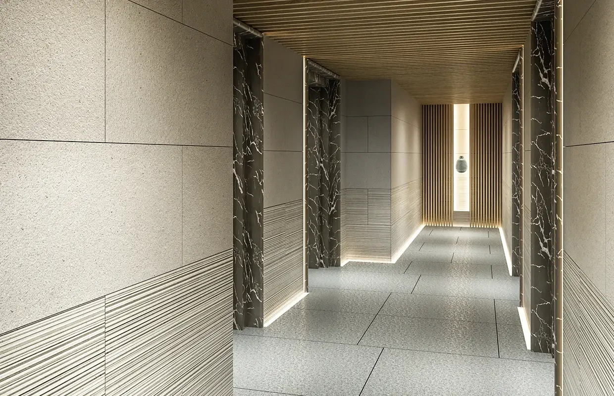 Modern hallway with textured walls, marble accents, and wooden ceiling lighting.