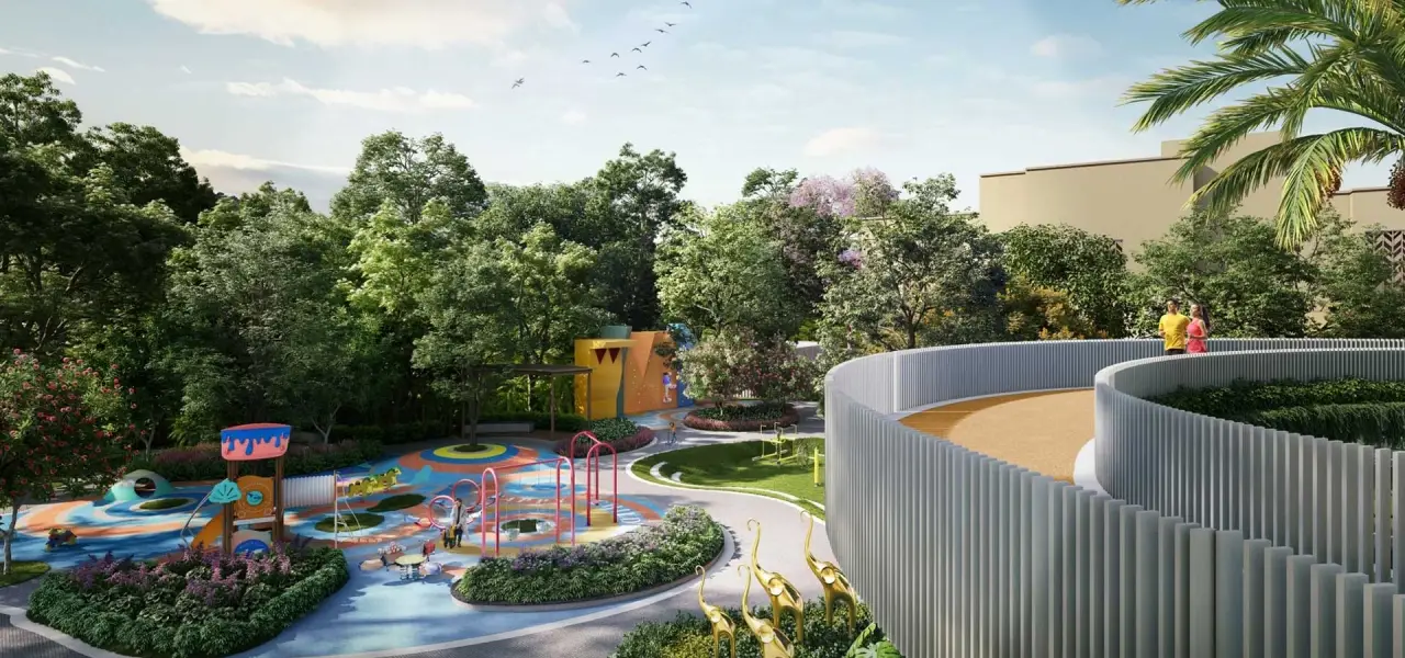 Colorful playground with slides and swings surrounded by greenery and pathways.