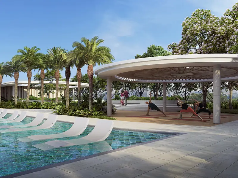 A serene poolside with lounge chairs, palm trees, and a yoga session under a circular pavilion.