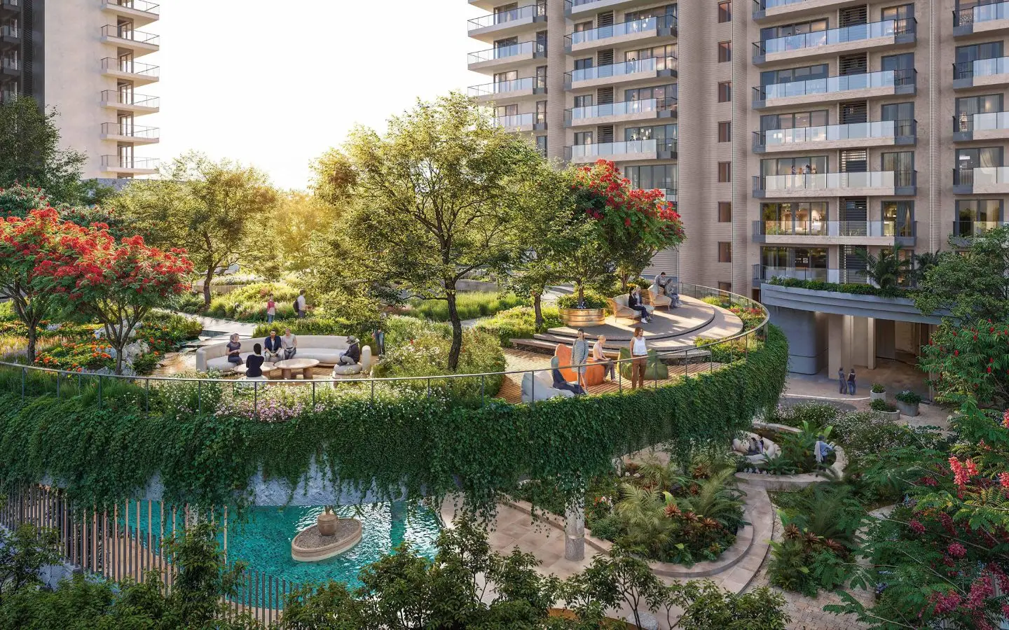 Lush green landscaping with trees and seating areas near modern residential buildings.