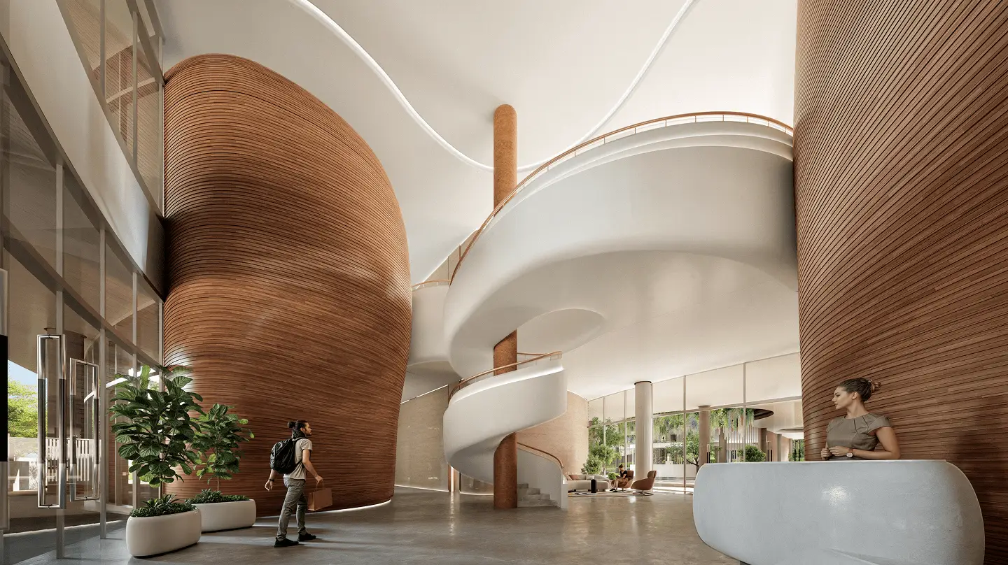 Interior of a modern lobby featuring curved wooden walls, a spiral staircase, and a reception area.