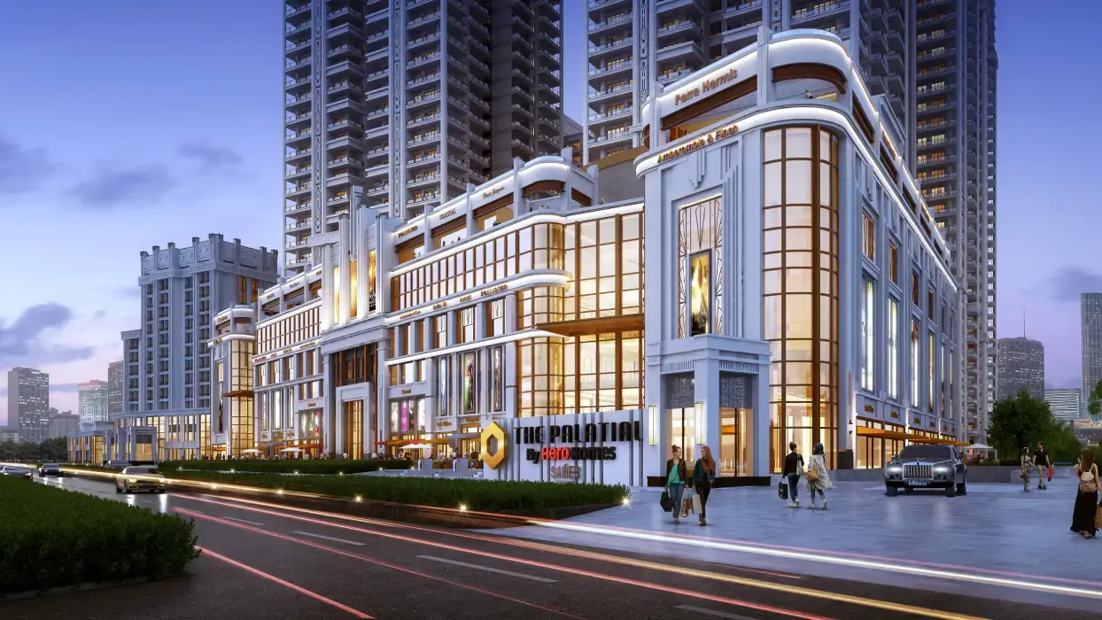 Modern building facade with large windows, illuminated signage, and people walking outside.