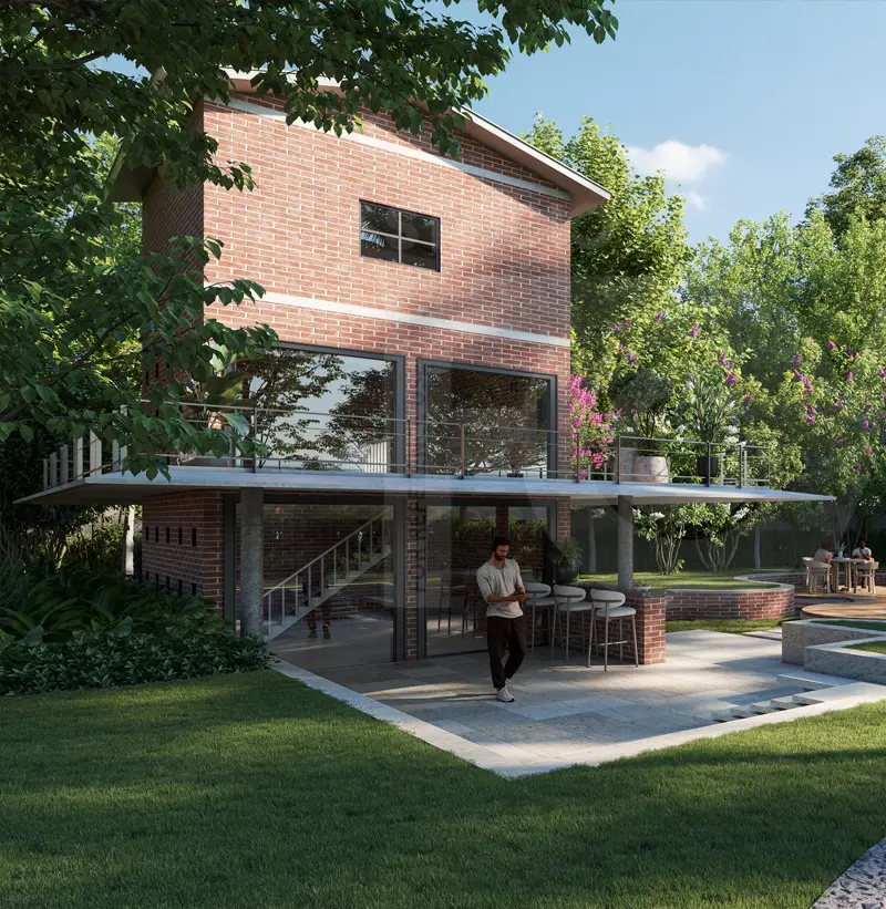 Modern brick house with large windows, surrounded by greenery and outdoor seating area.