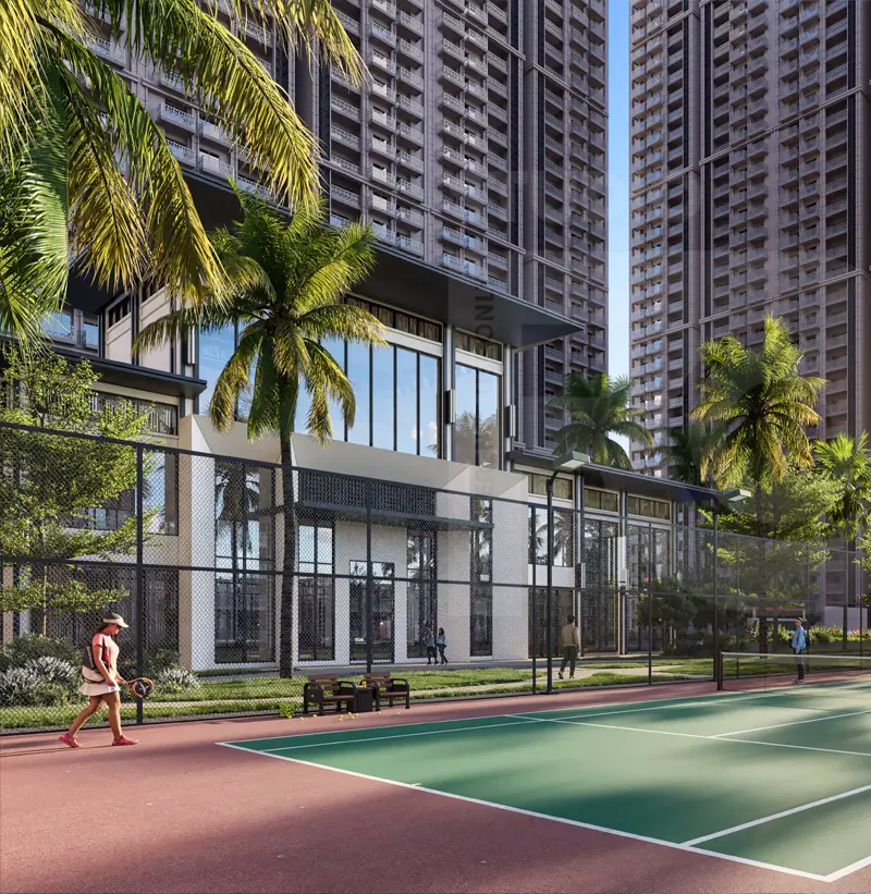 A tennis court with a player, surrounded by palm trees and modern buildings.