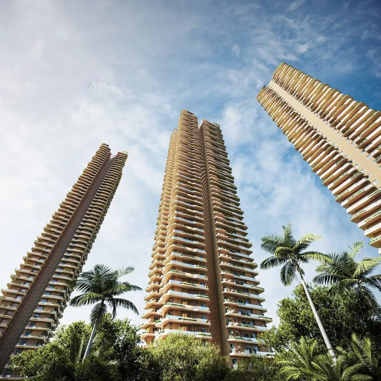 Three tall residential buildings with balconies surrounded by palm trees and blue sky.