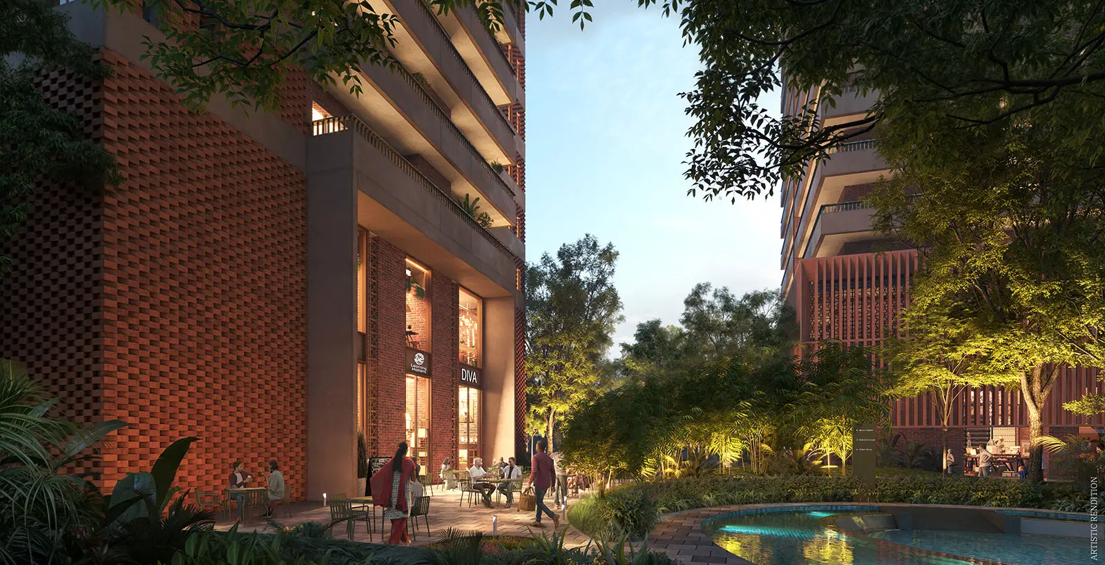 Outdoor area with people dining, lush greenery, and modern brick buildings under a clear sky.