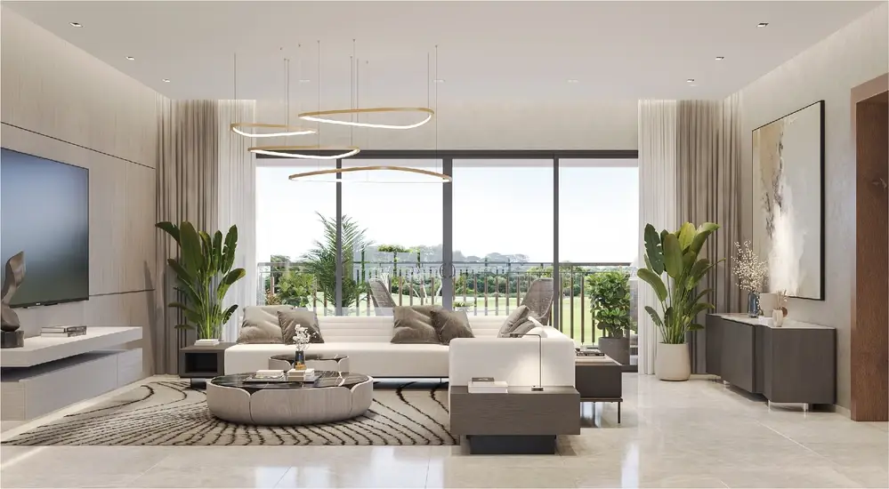Spacious living room with white sofa, large windows, plants, and contemporary decor.