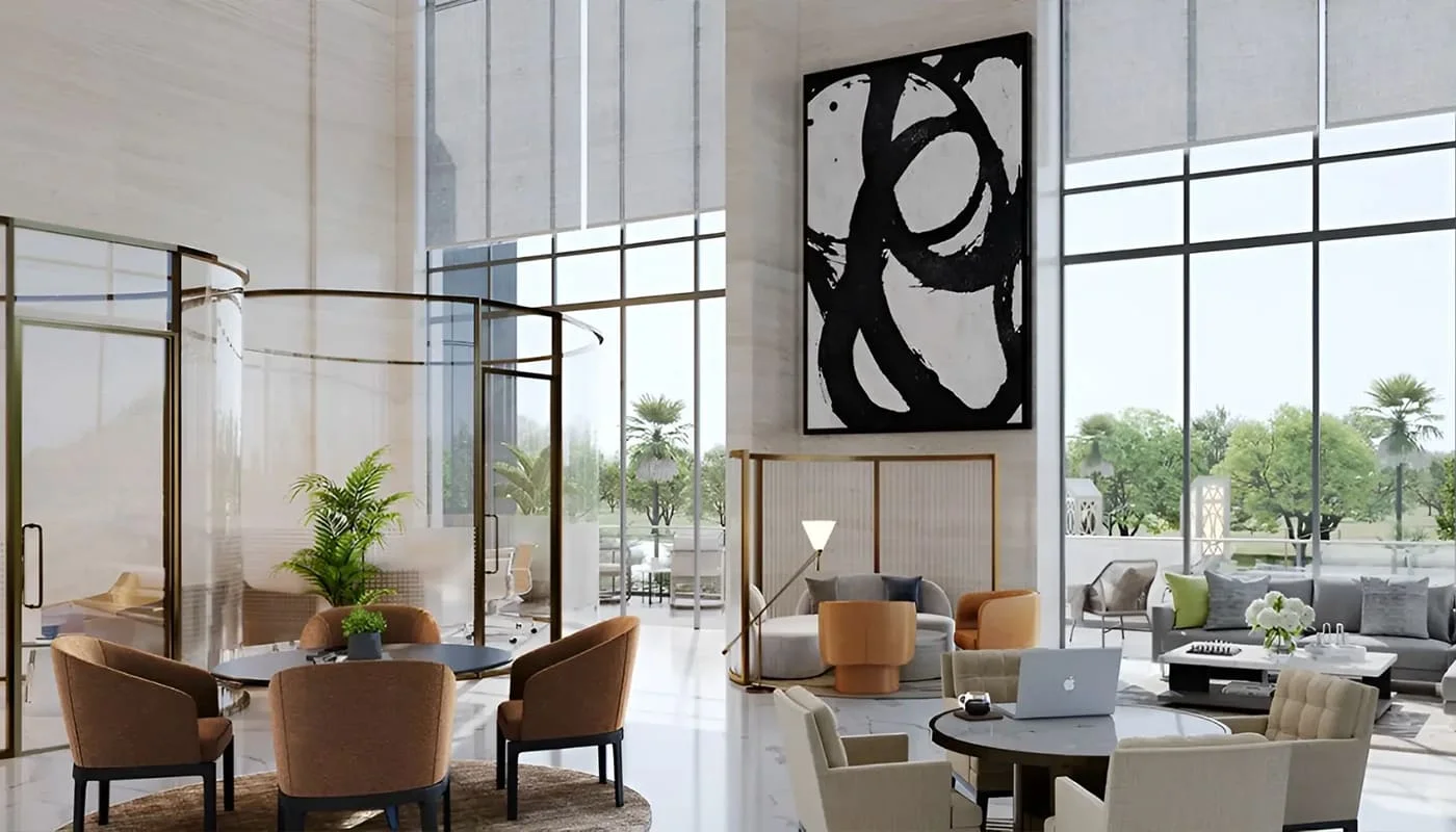 Spacious lobby with large windows, contemporary furniture, and abstract wall art.