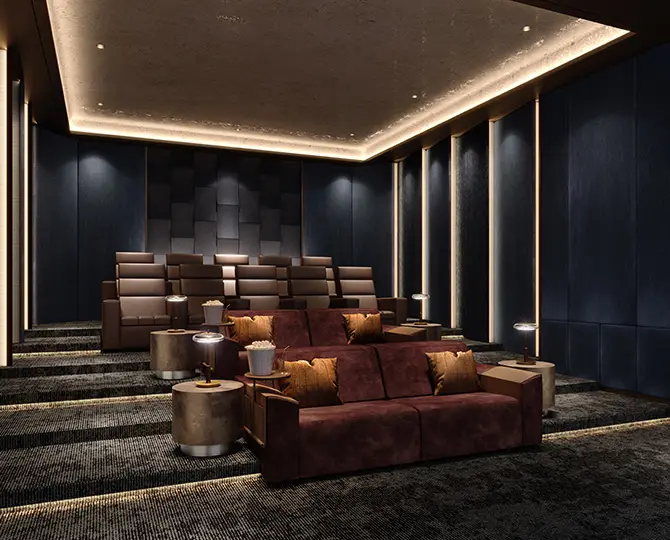 Luxurious home theater with plush seating, ambient lighting, and decorative side tables.