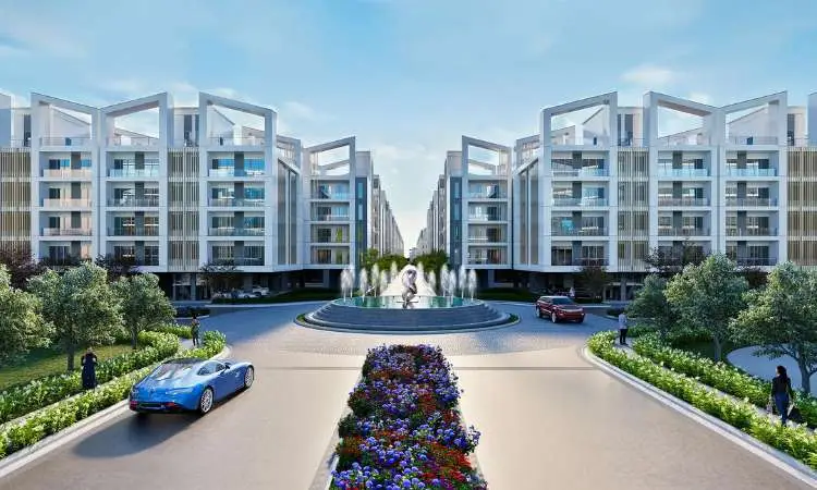 Modern residential buildings with a central fountain and landscaped gardens, featuring colorful flower beds.