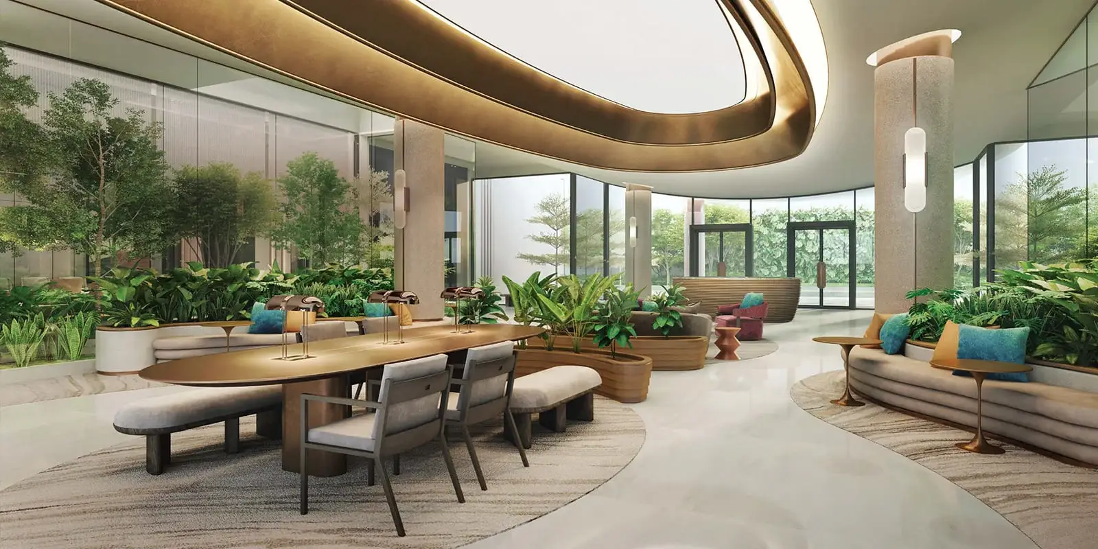 Spacious lobby with large windows, greenery, a round table, and comfortable seating.