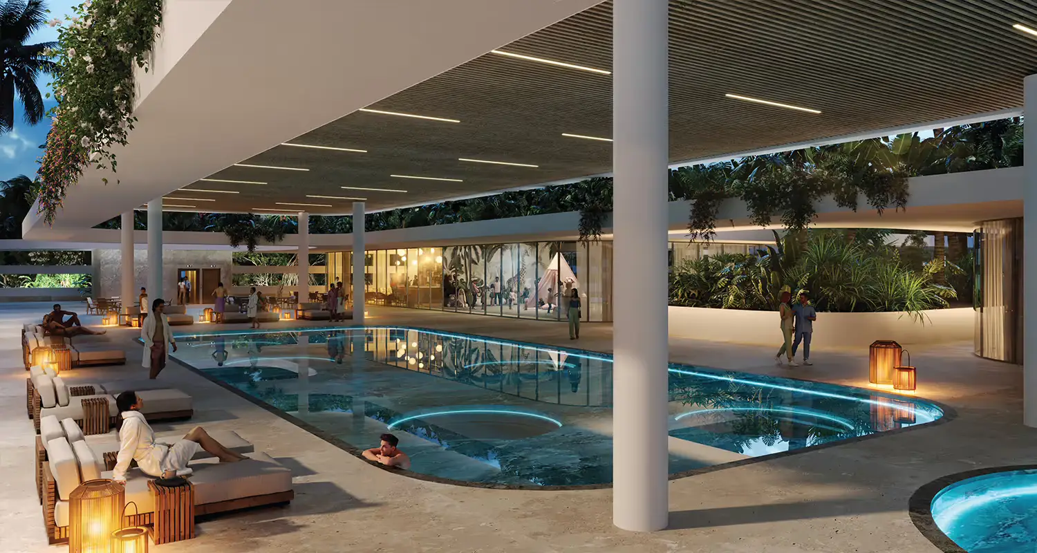 Modern swimming pool area with lounge chairs, palm trees, and ambient lighting.