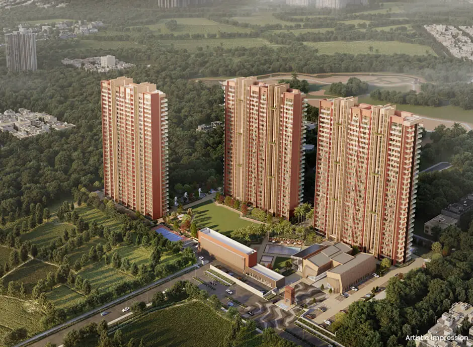 Aerial view of Eldeco Fairway Reserve featuring four tall residential buildings surrounded by greenery.
