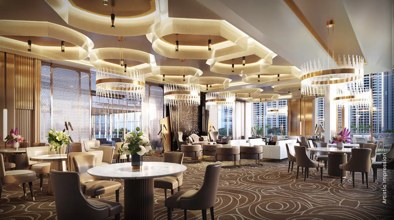 Elegant lounge with modern furniture, round tables, decorative lighting, and large windows.